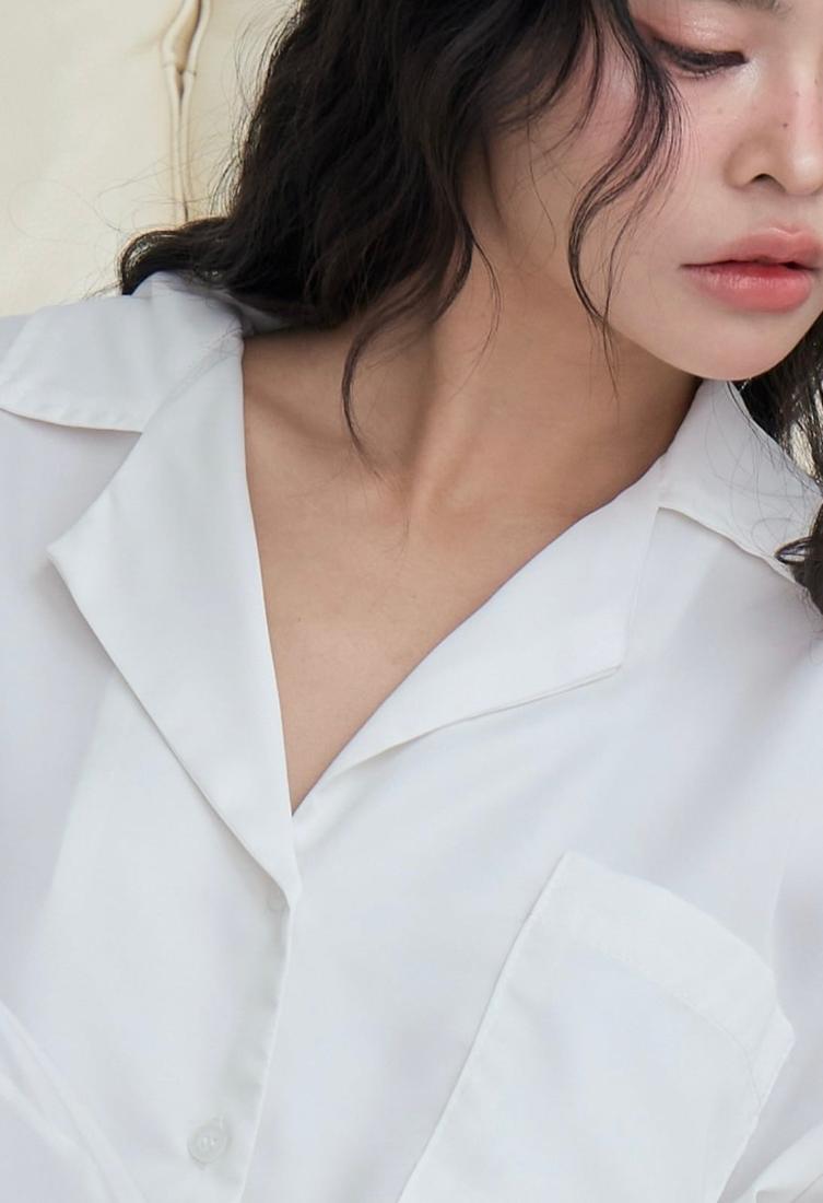 Model in a white Dreamwave pyjama shirt, close-up