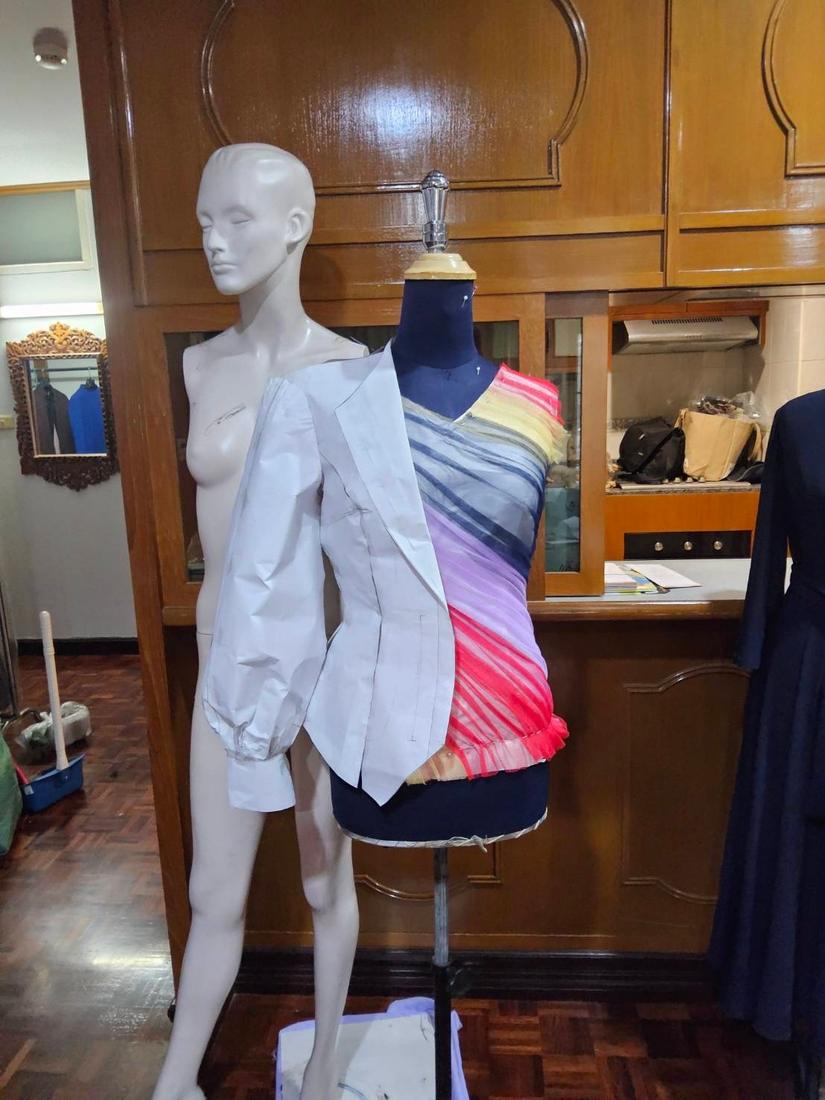 Garments in progress on dress forms in the Chayanna studio