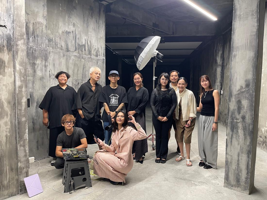 The editorial shoot team together on set